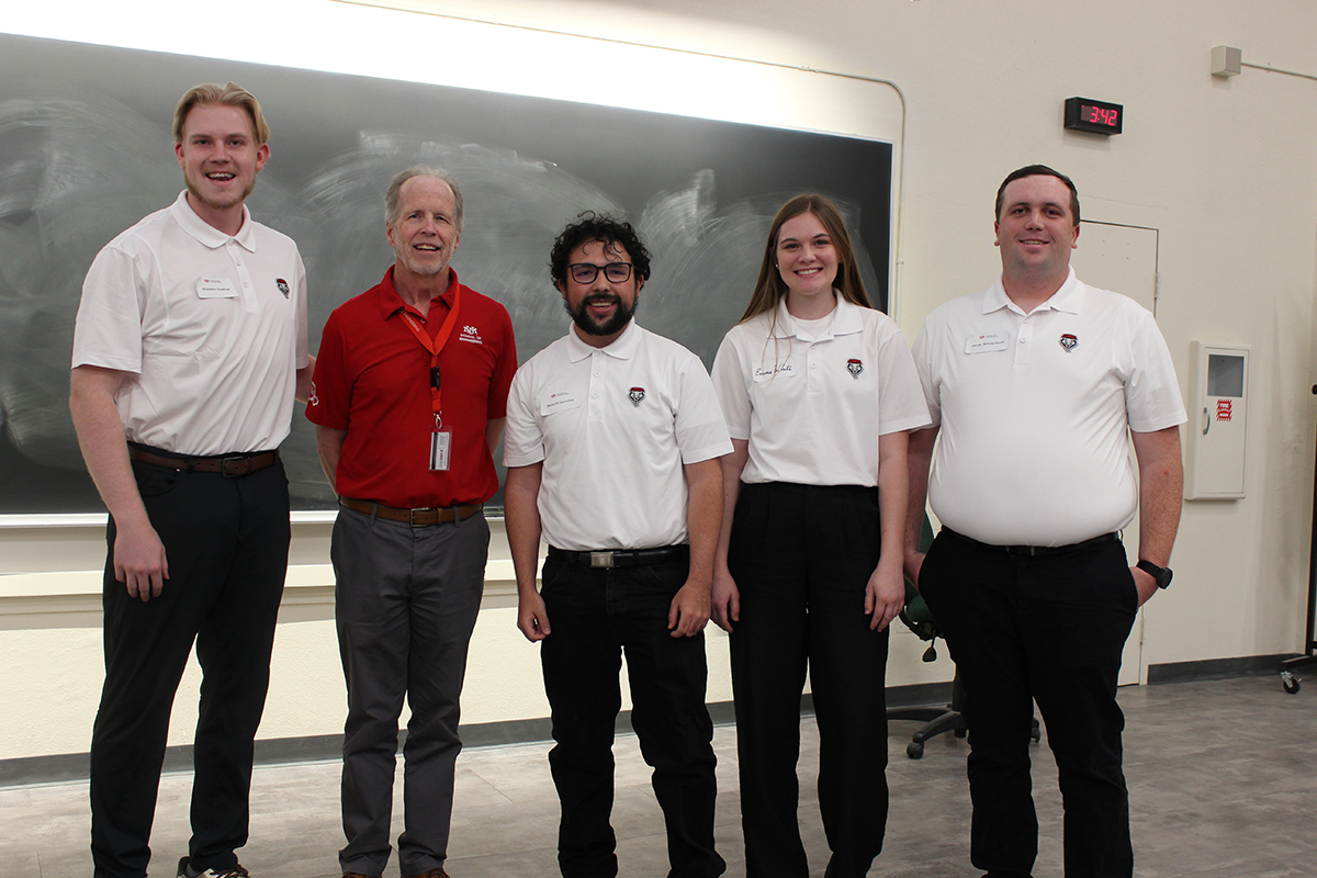 photo: Poster winners from the Department of Mechanical Engineering pose with Charles Fleddermann.