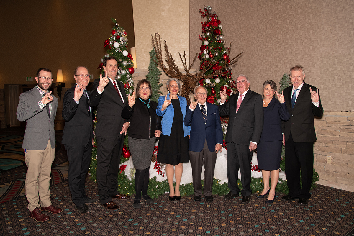 Photo: Donna Riley, Jim and Ellen King Dean of Engineering and Computing (in blue), with the 2023 Distinguished Alumni Award winners at Sandia Resort and Casino. (Photo by Kate Rodriguez Duran)