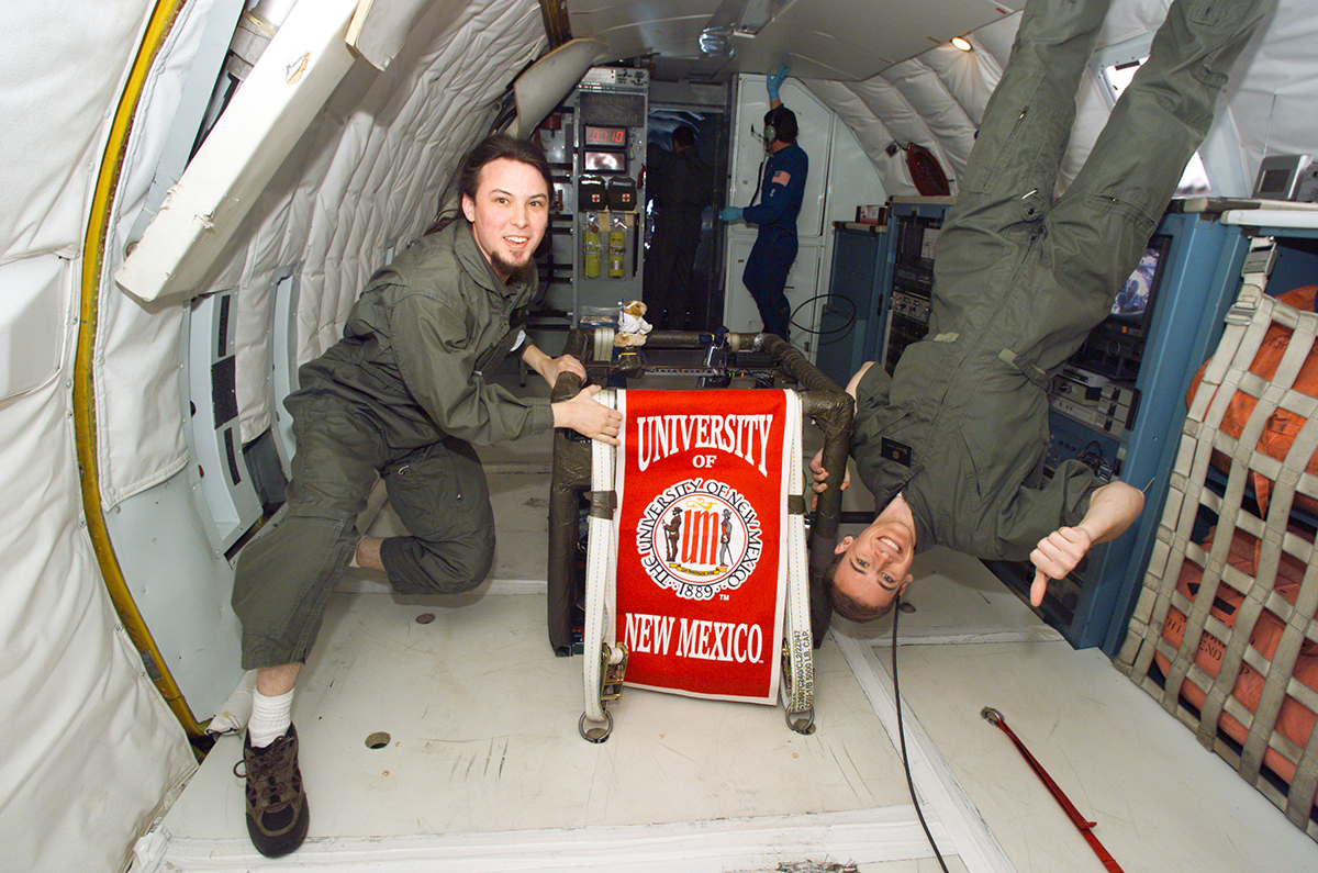 photo: Daniel Casey (left) as a student at UNM with fellow nuclear engineering student Thomas Quirk at the microgravity university KC-135 simulation.
