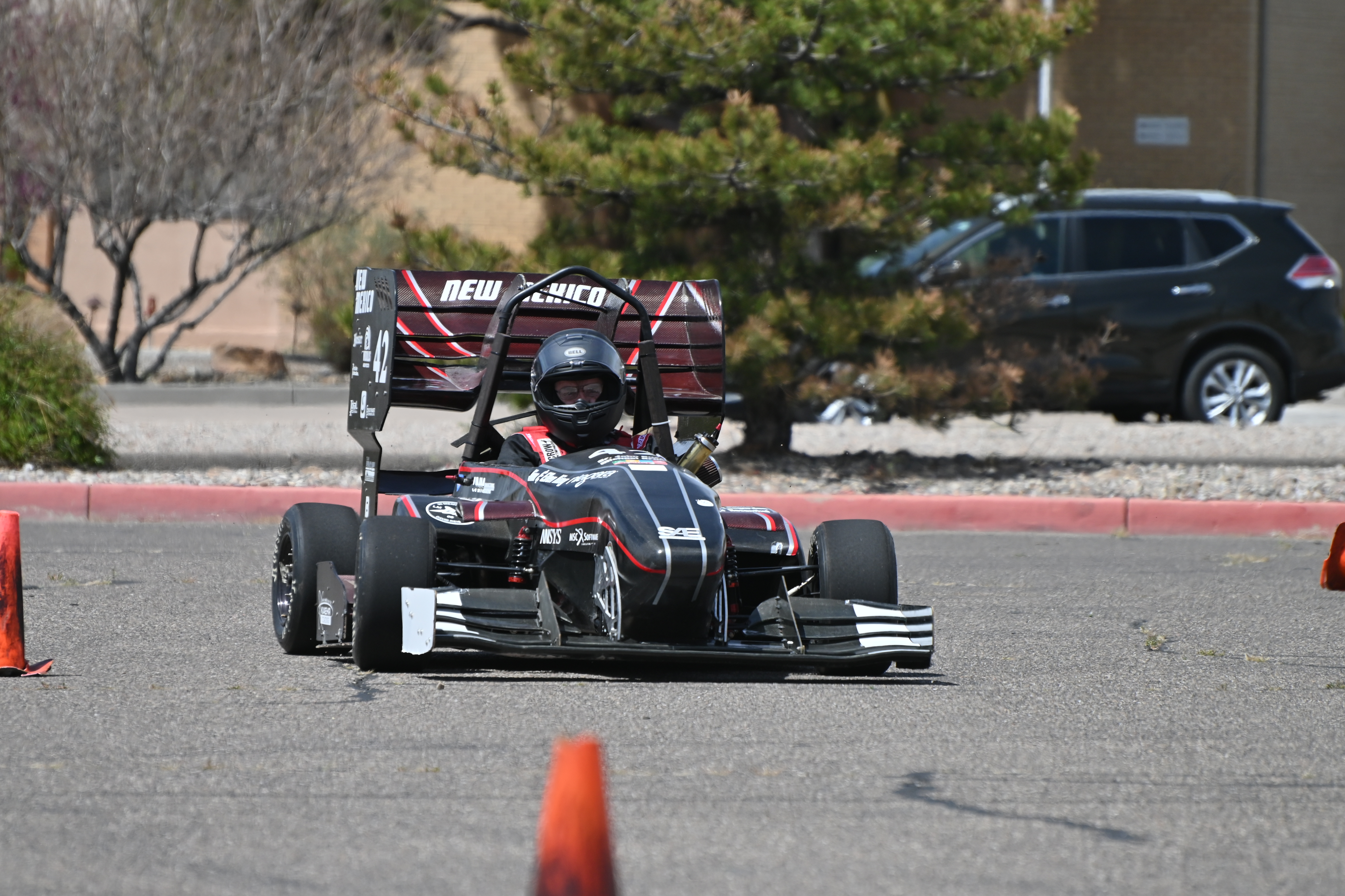 photo: Doug Wood (whose family funded the Dana C. Wood FSAE Racing Lab and Garage) on the track.