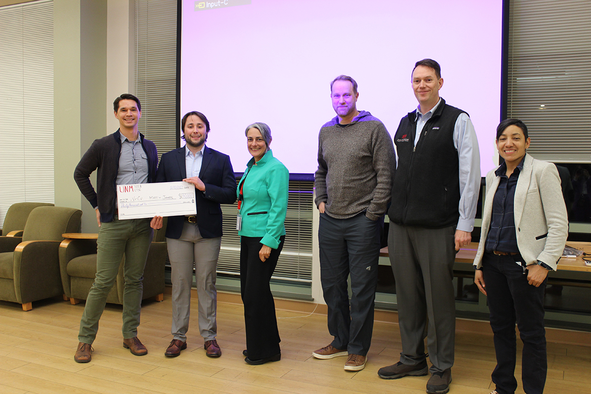 Photo: Top winners, “iVrCv: Immersive Virtual Reality Clinical Video,” with the judges and Christina Salas.
