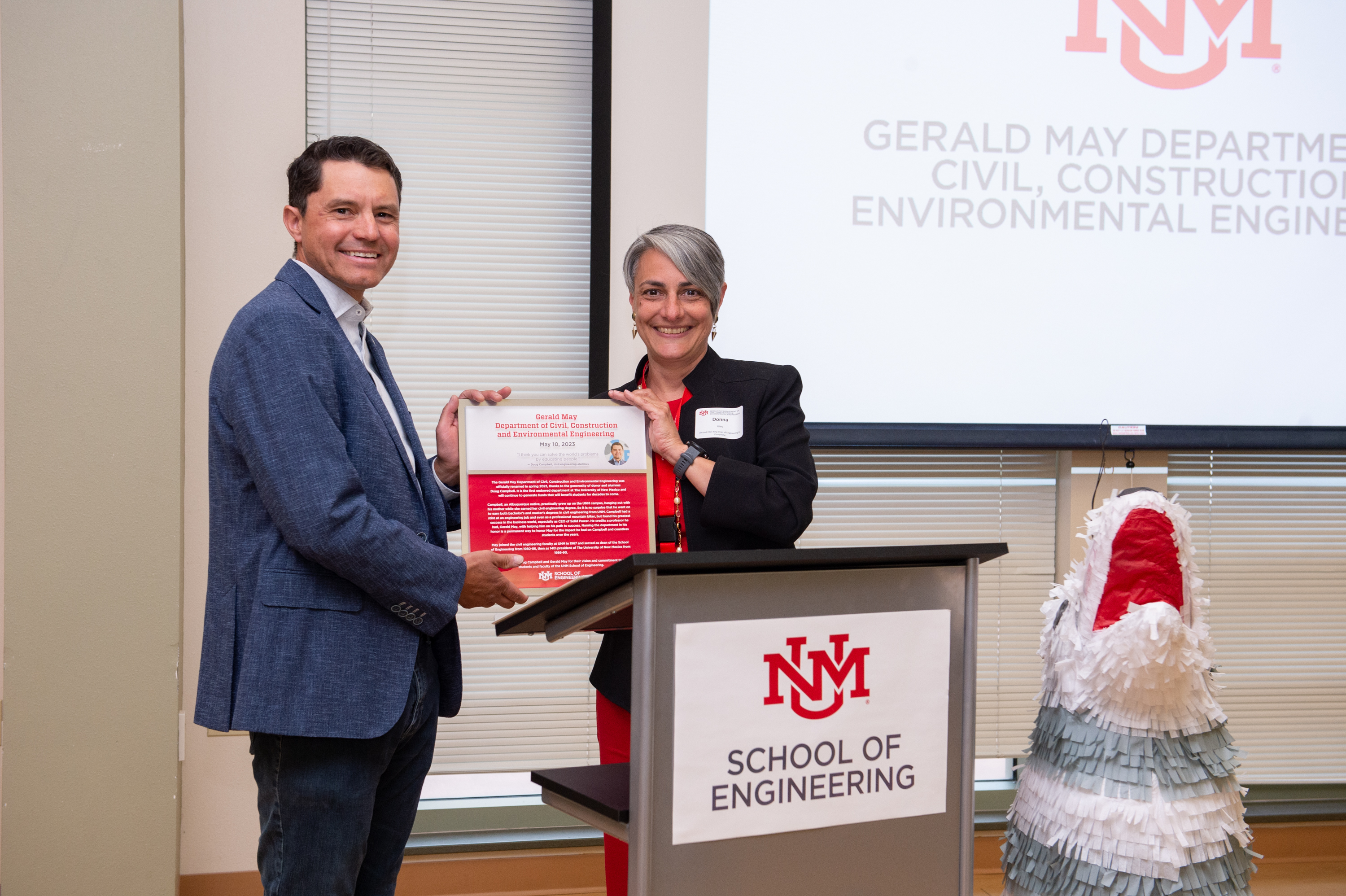 Photo: Doug Campbell and Donna Riley at the renaming ceremony for the Gerald May Department of Civil, Construction and Environmental Engineering in May 2023 (photo by Kate Rodriguez Duran).