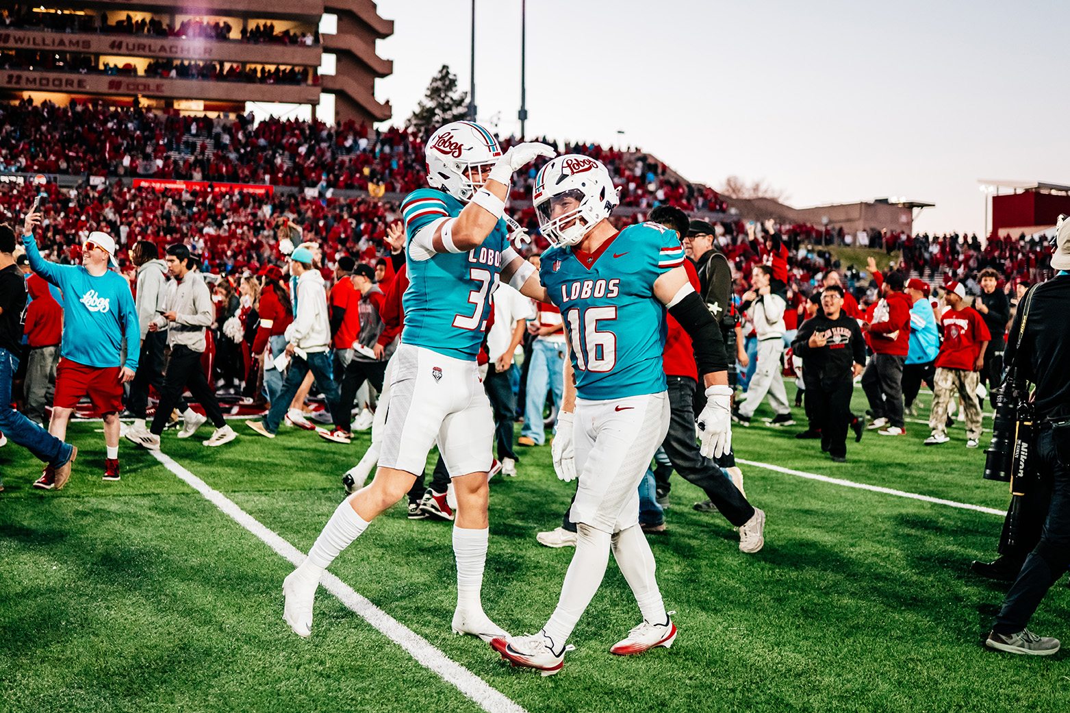 photo: Mercury Swaim and another football teammate together at a game